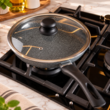 Frigideira Granilite 24cm cinza com tampa de vidro e revestimento cerâmico. Compatível com indução, elegante e prática para sua cozinha.